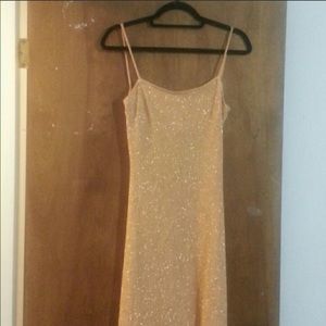 Alexia Admor floor length gold dress.